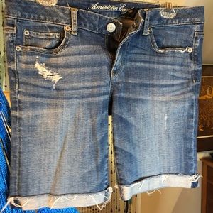 Near Knee-length Stretch Jean Cut-off Shorts
